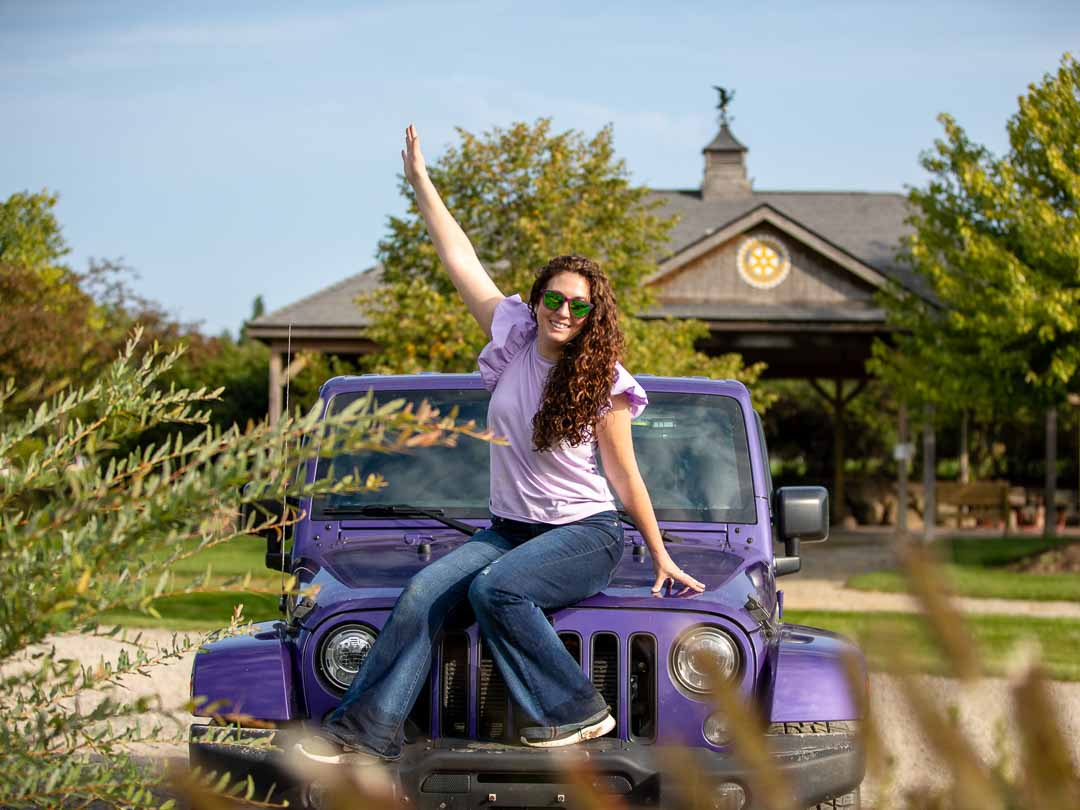 Courtney Conley aka Jeep Girl Court in front of mural in Eastern Market, Detroit